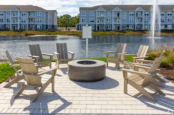 Outdoor gathering area with grilling station & fire pit